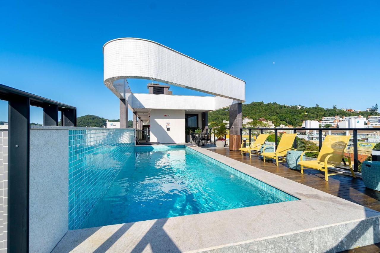 Confortavel Loft Em Condominio Com Piscina Бомбиняс Екстериор снимка